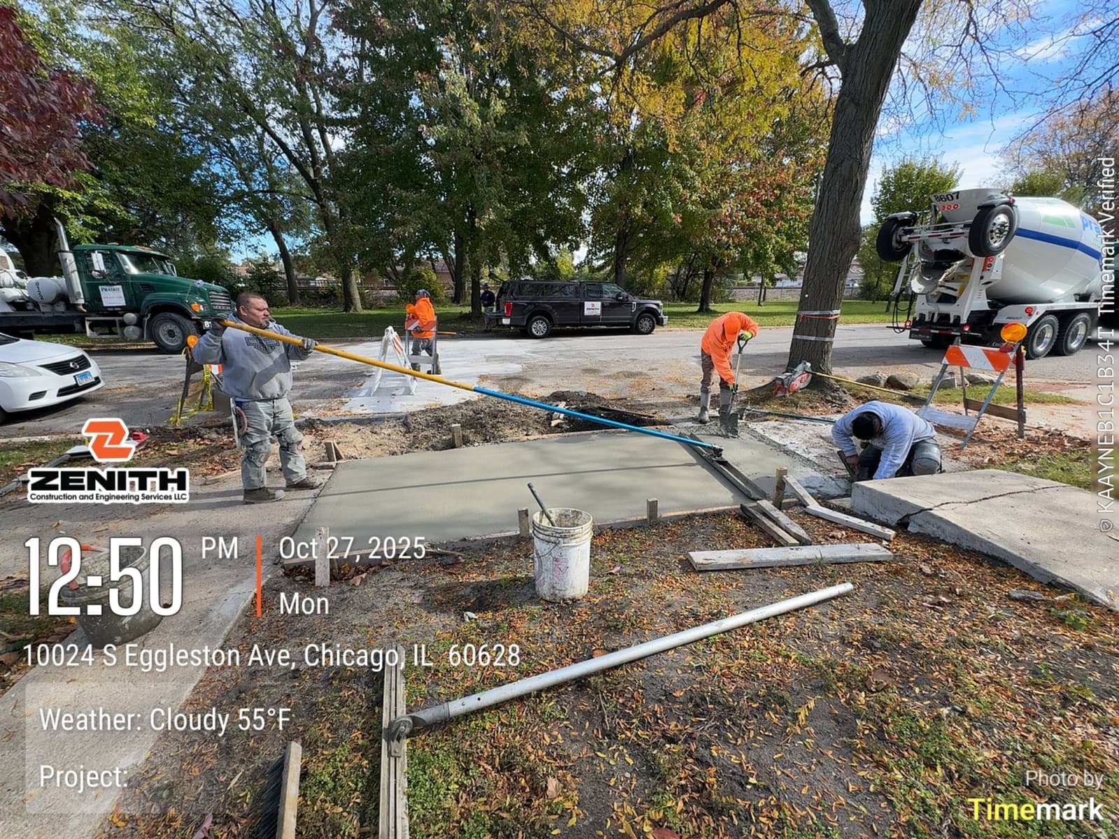 Crew finishing a fresh concrete pour at 10024 S Eggleston Ave, Chicago