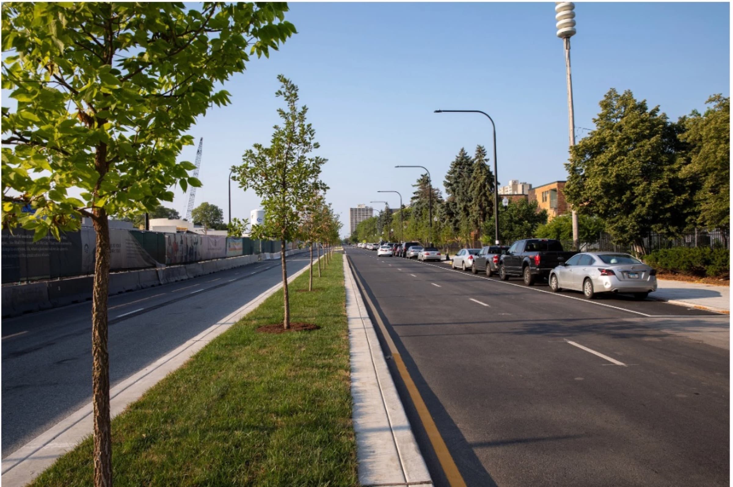 Newly paved road corridor with landscaped median at Jackson Park, Chicago